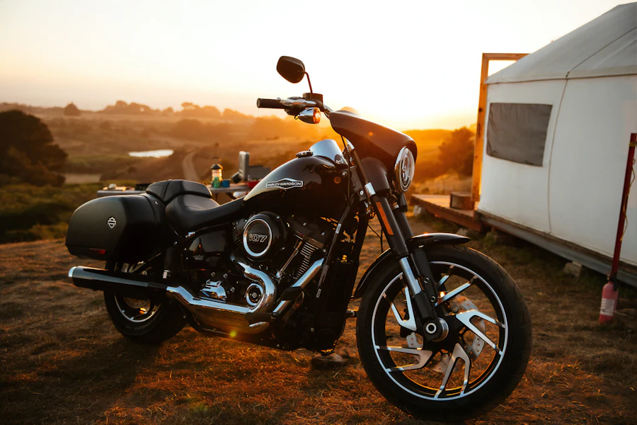Cruiser motorcycle parked at sunset